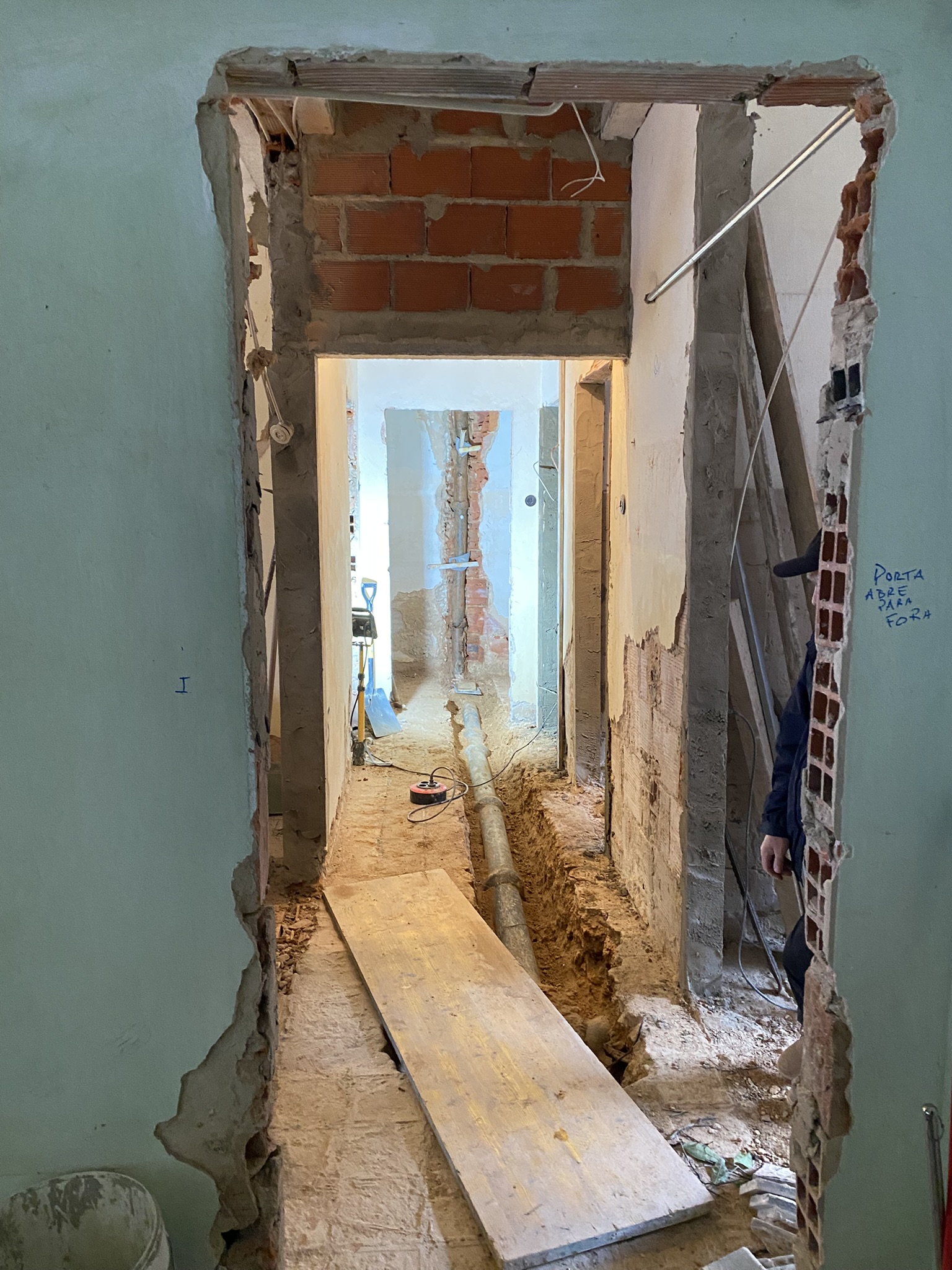 Hallway with the old plumbing escavated